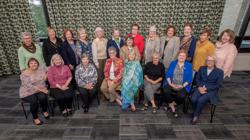 The Mundelein College and Gannon Scholars Alumnae Board attend a board meeting.