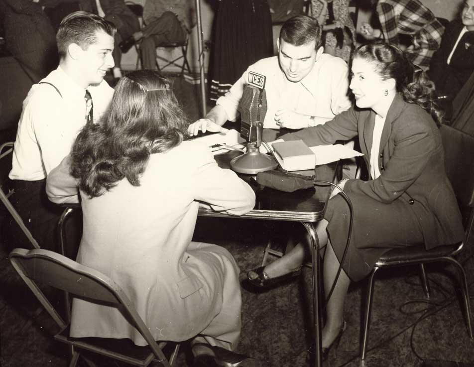 Students participate in the Loyola radio show of 1947 Students participate in the Loyola radio show of 1947