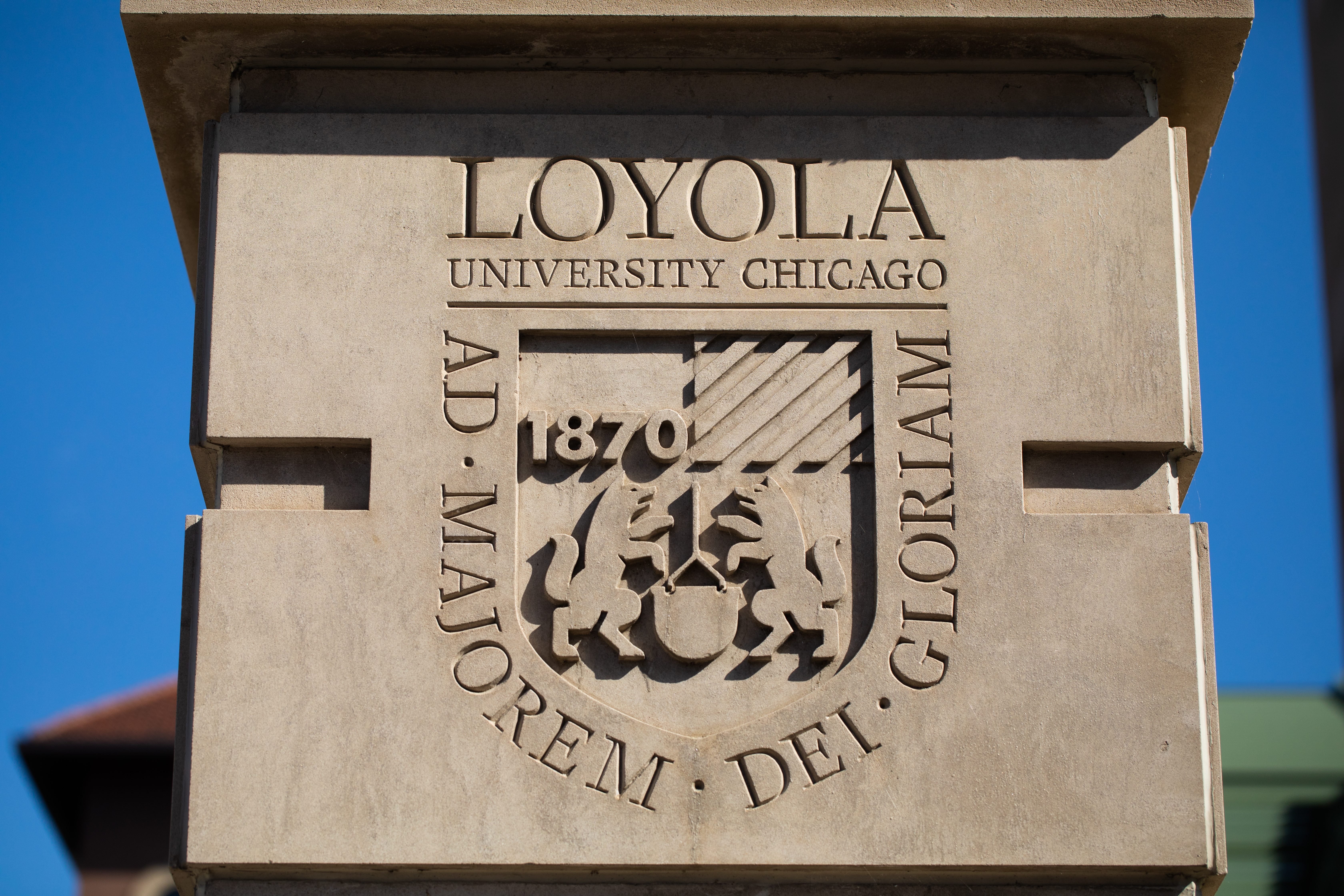 Loyola Logo on Campus 