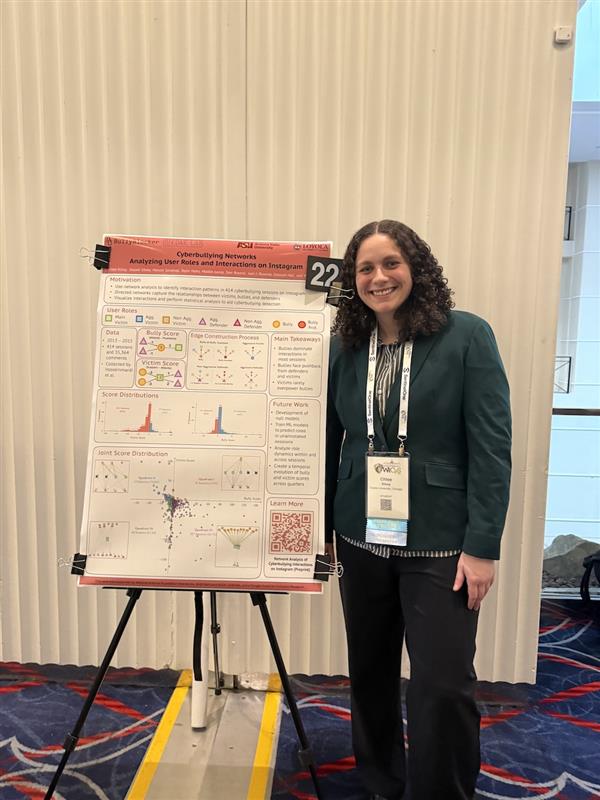 Student, Chloe Kilroy, presenting her presentation at the Women in Cybersecurity conference. 