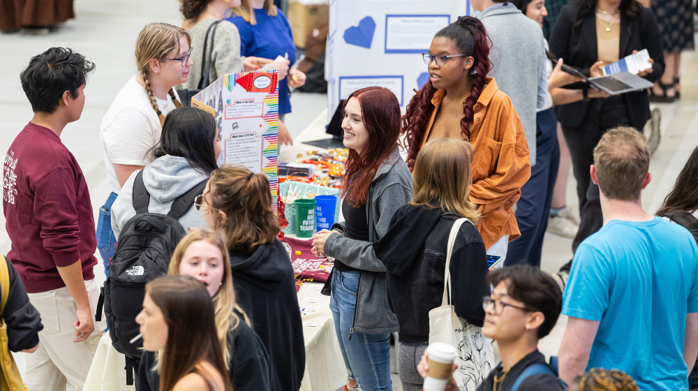 The Future Teacher Club meets with new students at an annual Org Fair.