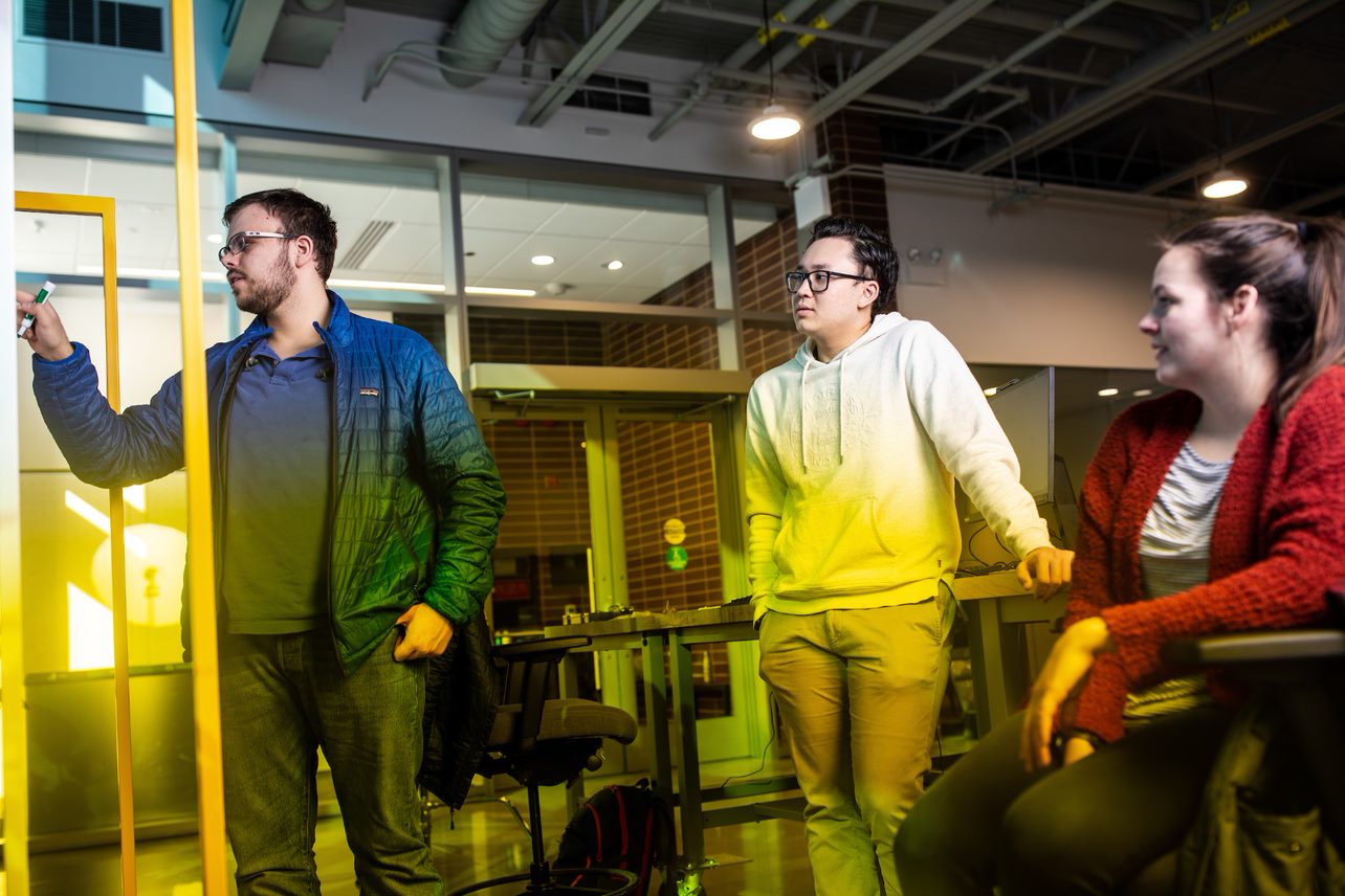 Engineering students working together in the Flex Lab