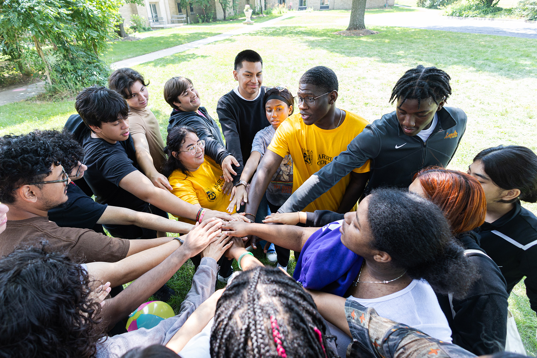 Orientation leaders play ice-breaker games with incoming Arrupe College students at the LUREC campus on August 10, 2023.