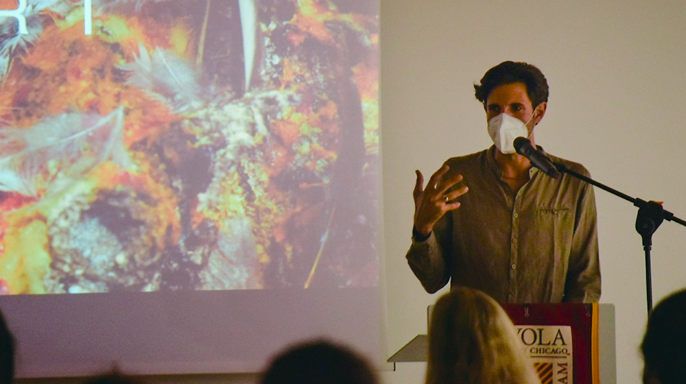 Award-winning photojournalist Francesco Bellina delivers Human Rights Night keynote address.