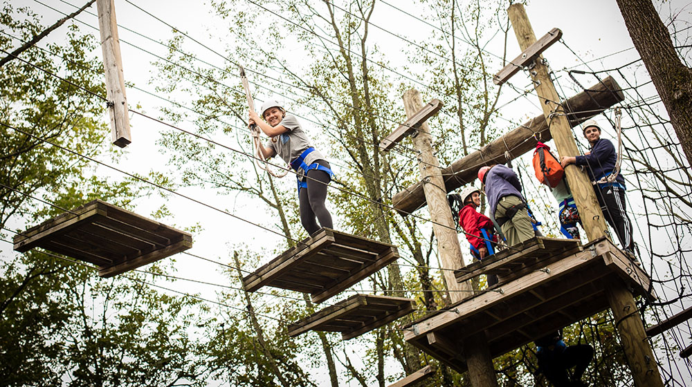 Students complete a high ropes course