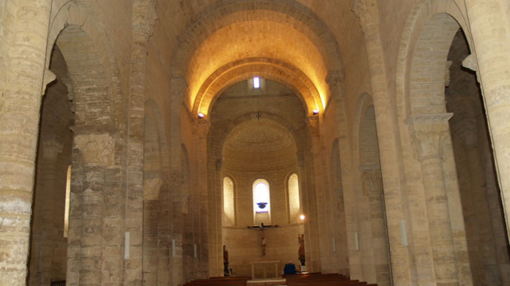 The inside stone archway of a medieval church