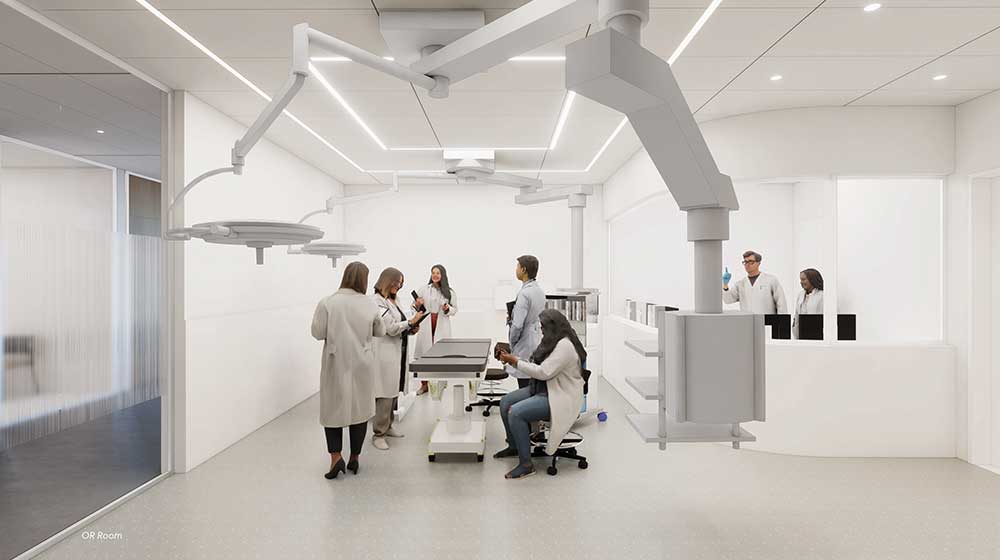 Rendering of a modern clinical training room with white walls, surgical lights, and people in lab coats working around equipment.