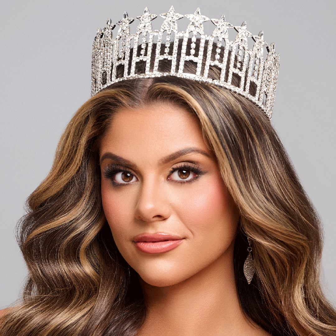 Headshot of Nikolina Vujcic, BSN '24, wearing a diamond crown and looking directly into the camera in front of a gray backdrop