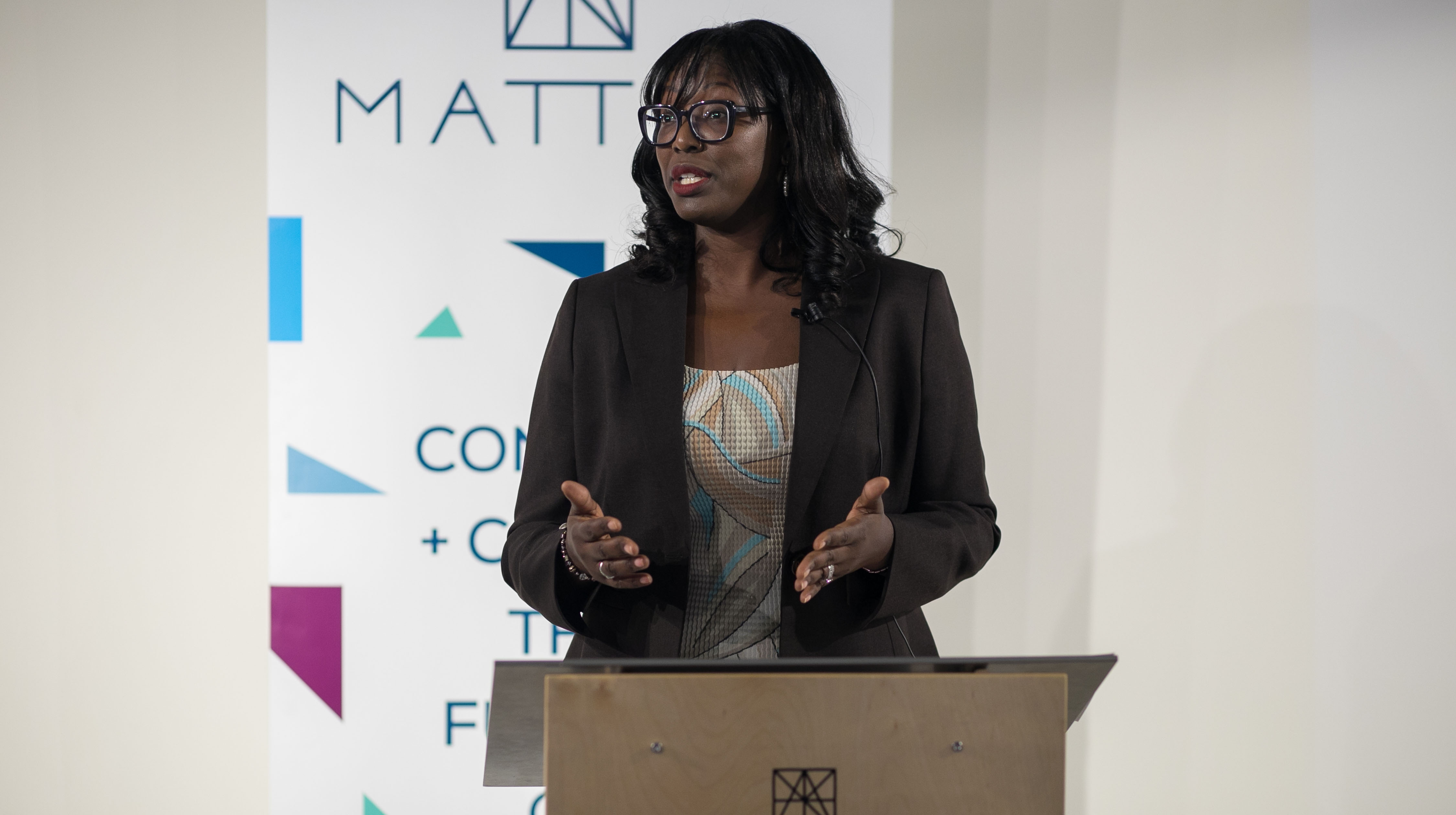 Photo of Jalonne White-Newsome at podium