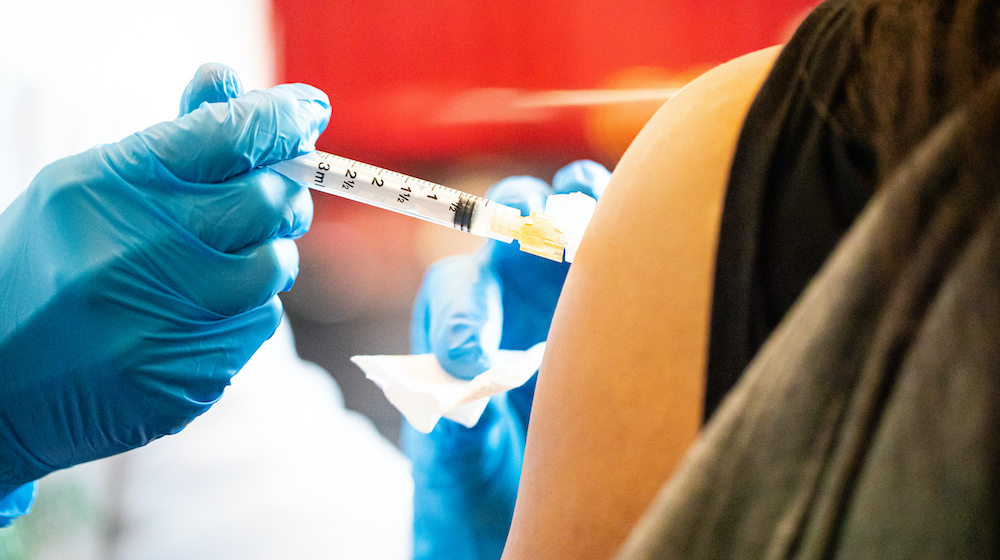 General image of person receiving COVID-19 vaccine