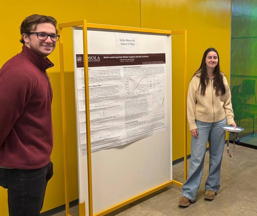 Students presenting poster