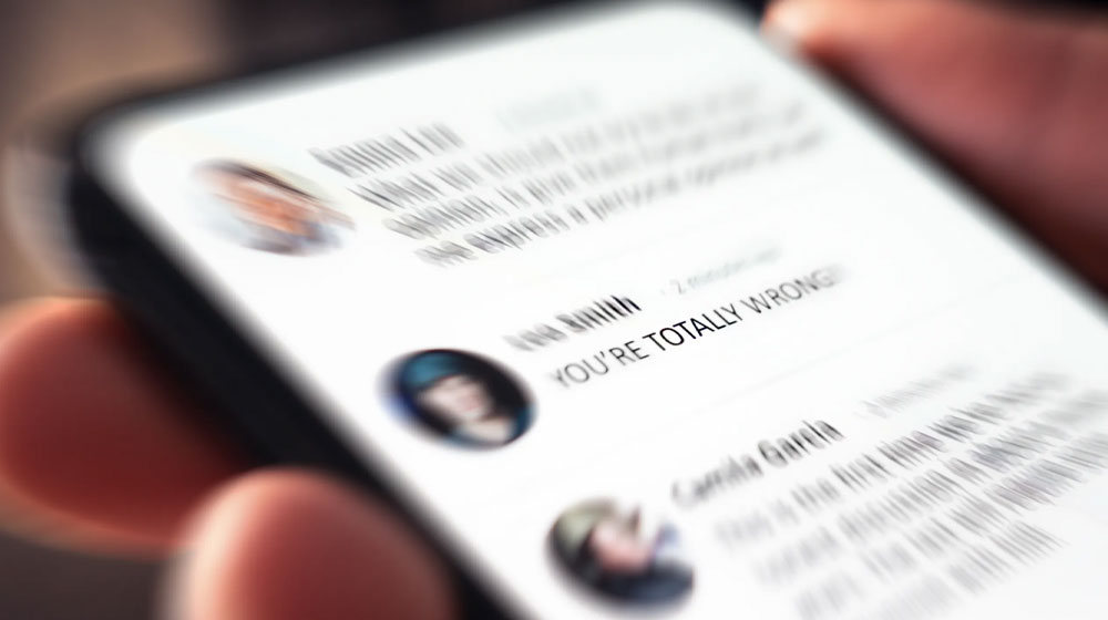 close up of phone screen with an angry text
