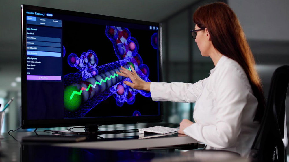 scientist analyzing a 3D molecular model on a monitor scientist analyzing a 3D molecular model on a monitor