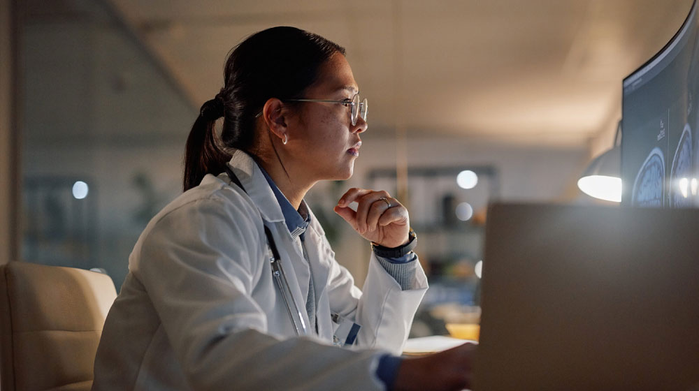 Female doctor at computer