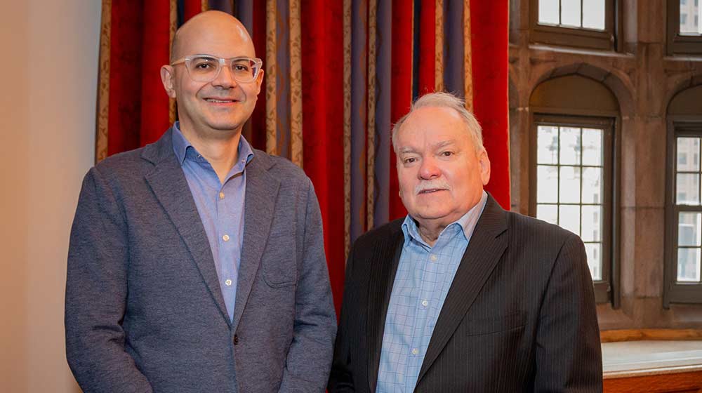 Julian Diaz and Doug Evanoff standing next to each other