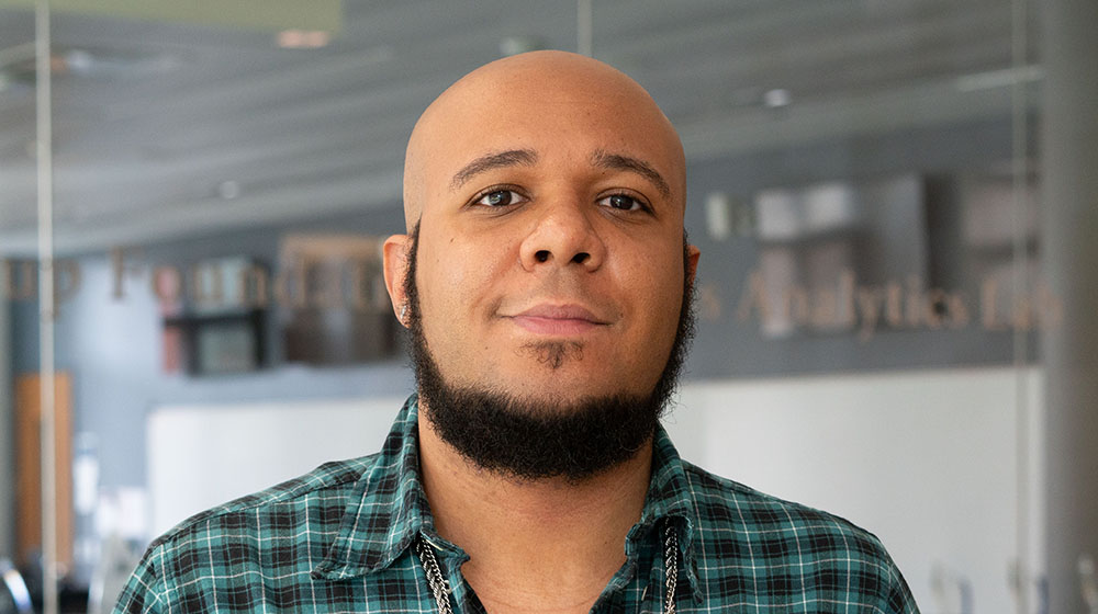 Headshot of Evan Nave in the Schreiber Center