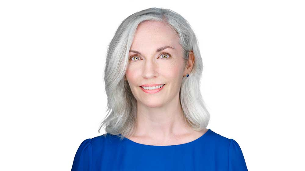 Headshot of Karyn Dossinger on a white background