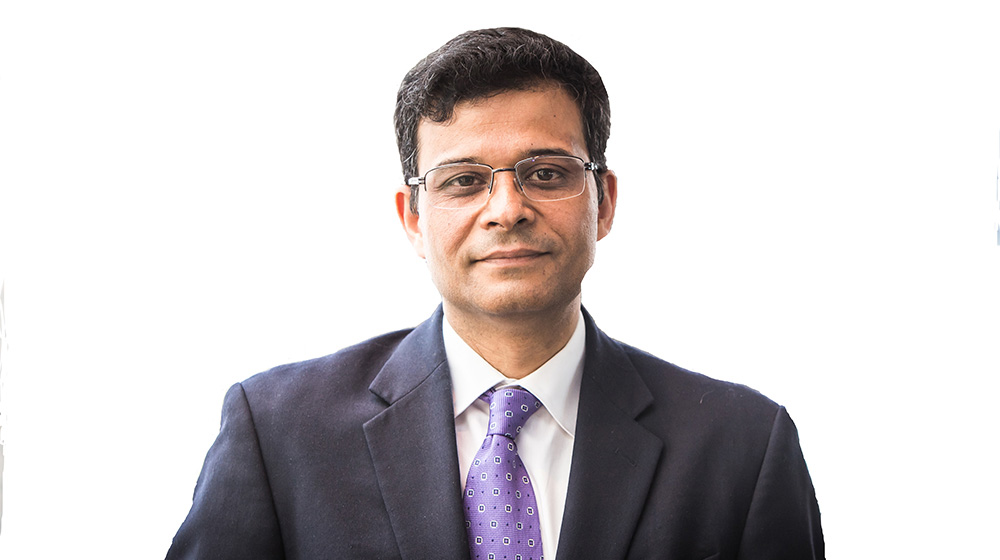 Headshot of Abhishek Sharma on a white background