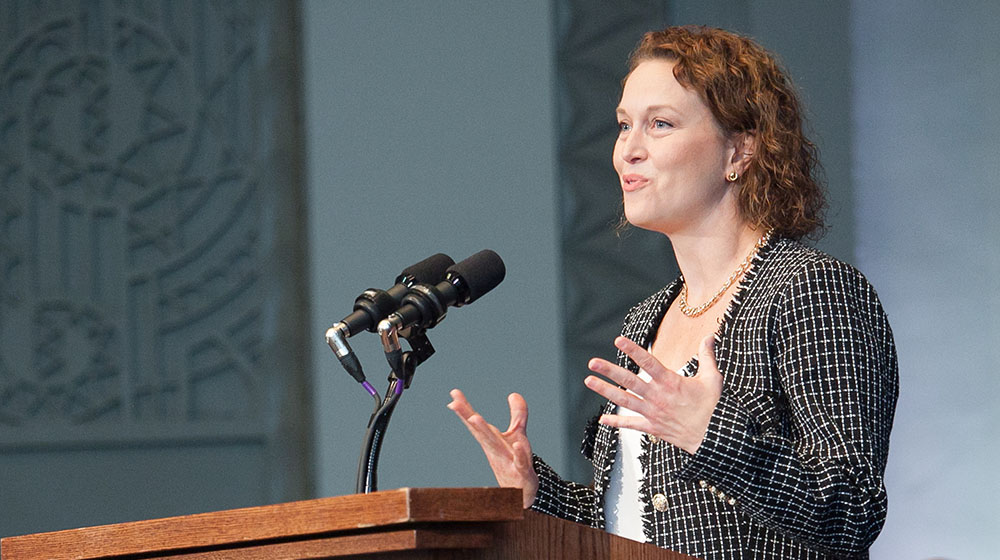 Associate Professor Jenna Drenten speaking at the 2023 faculty convocation, where she was awarded the Faculty Member of the Year