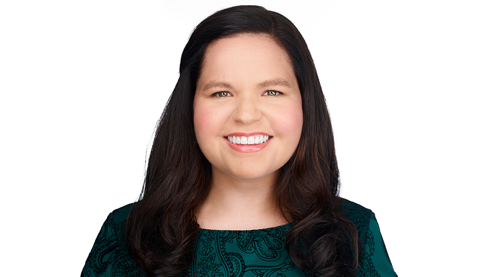 Headshot of Katie Alexander on a white backgound