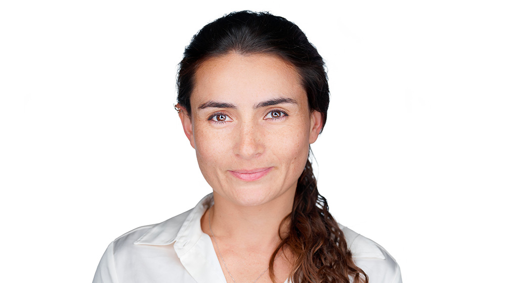 Headshot of Diana Acosta Navas, Assistant Professor of Management and Business Ethics at Quinlan School of Business