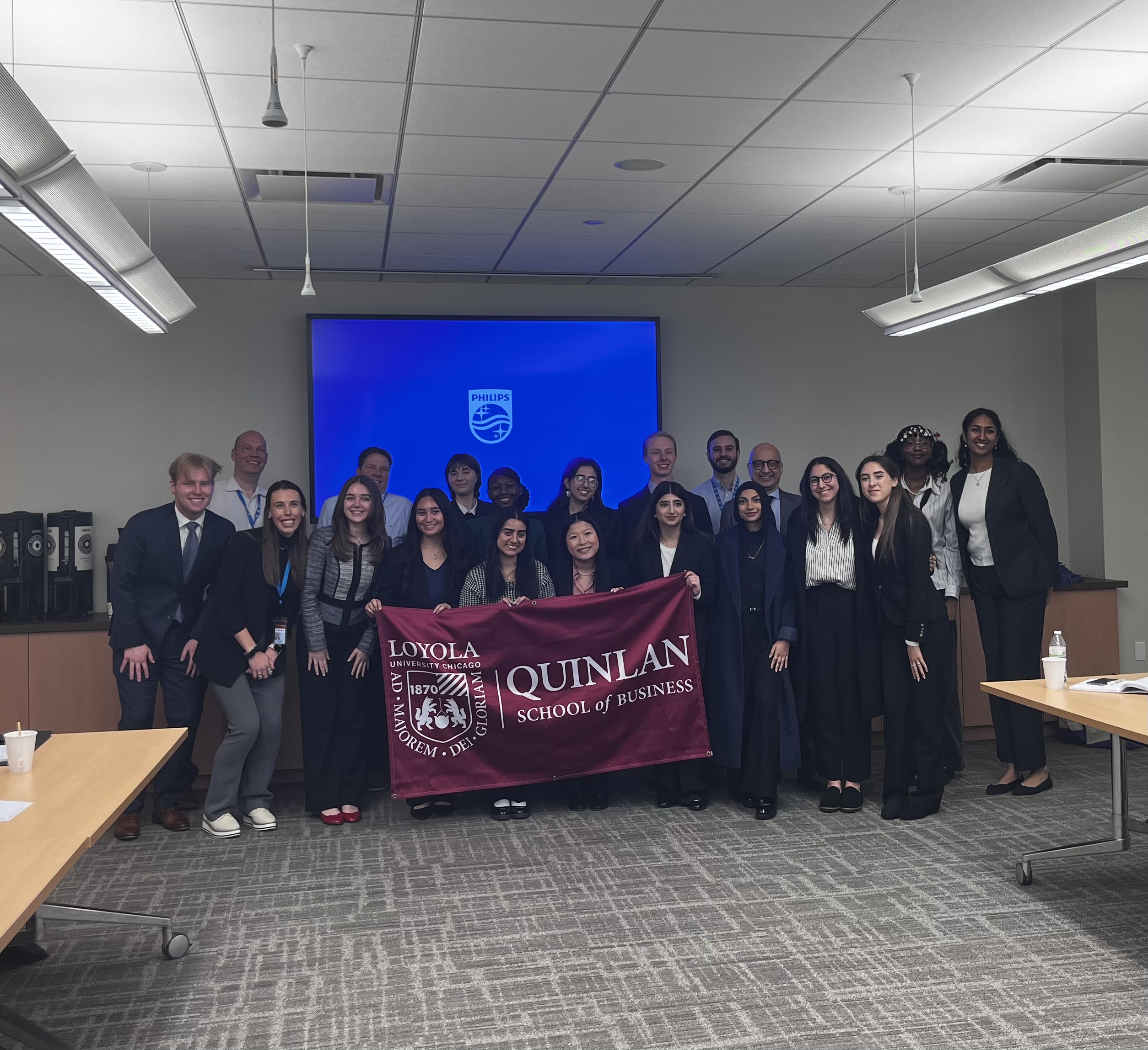 The Ramble to NYC students pose for a group photo at a site visit to Philips Health.