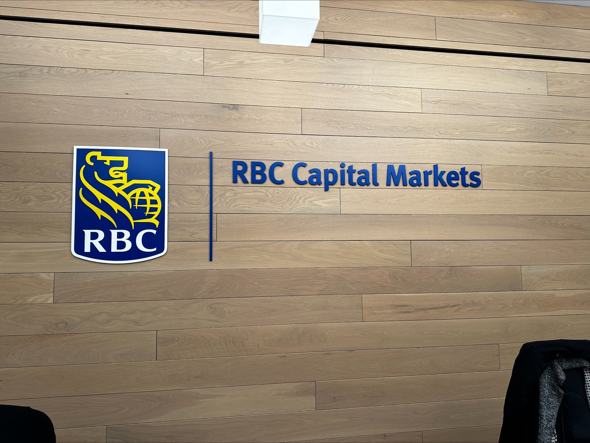 The Royal Bank of Canada logo on a wall.