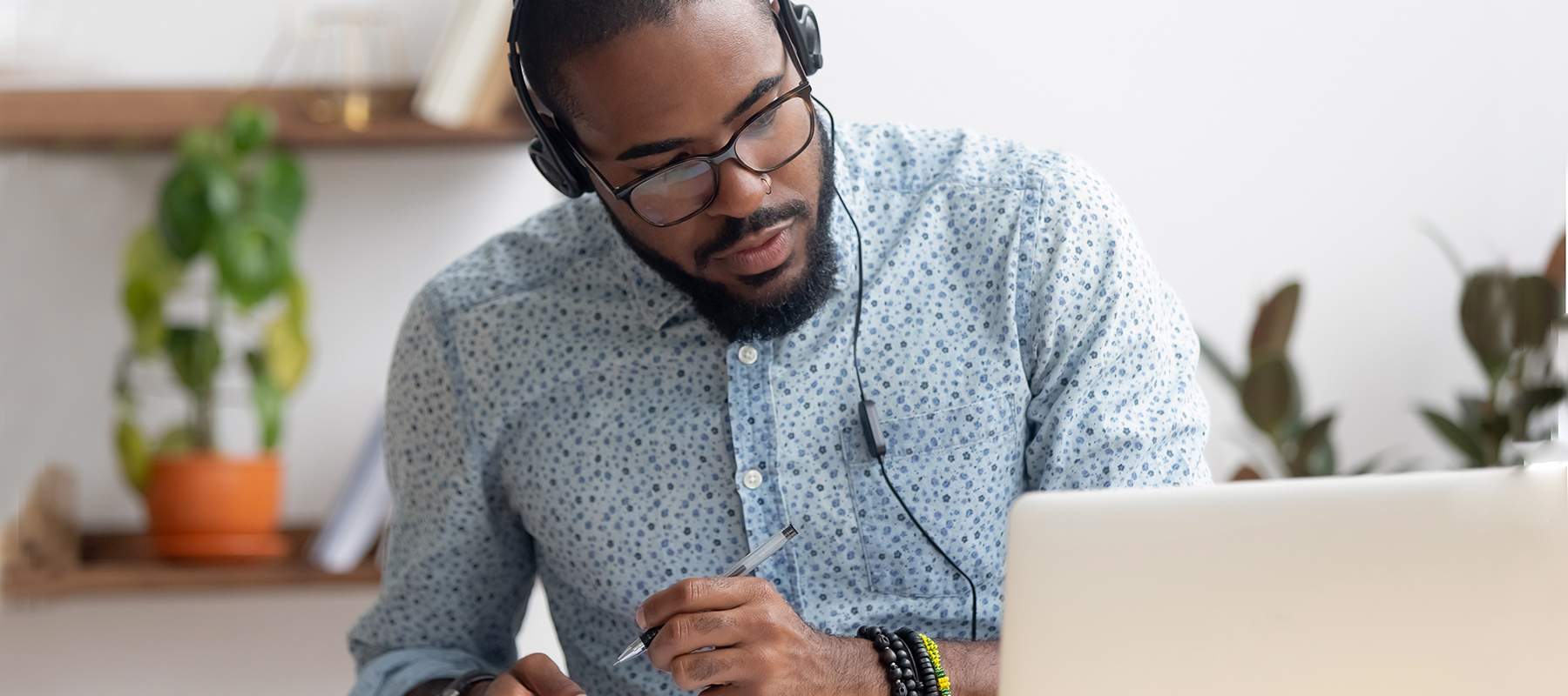 man taking online classes