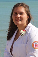 Image of Lauren Kunzer in front of the lake