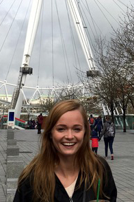 Image of Maranda Archer in front of a Ferris wheel