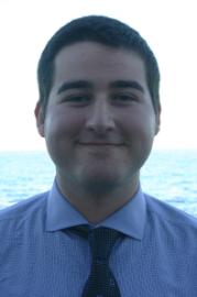 Headshot of Michael Marino in front of the lake