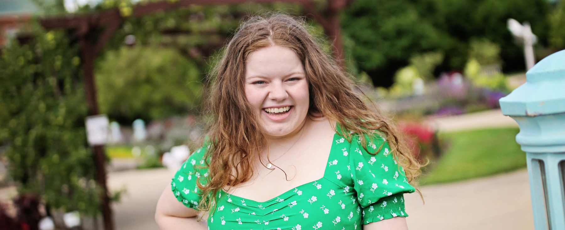 Loyola student Gretchen Rojewski smiling outside at the park