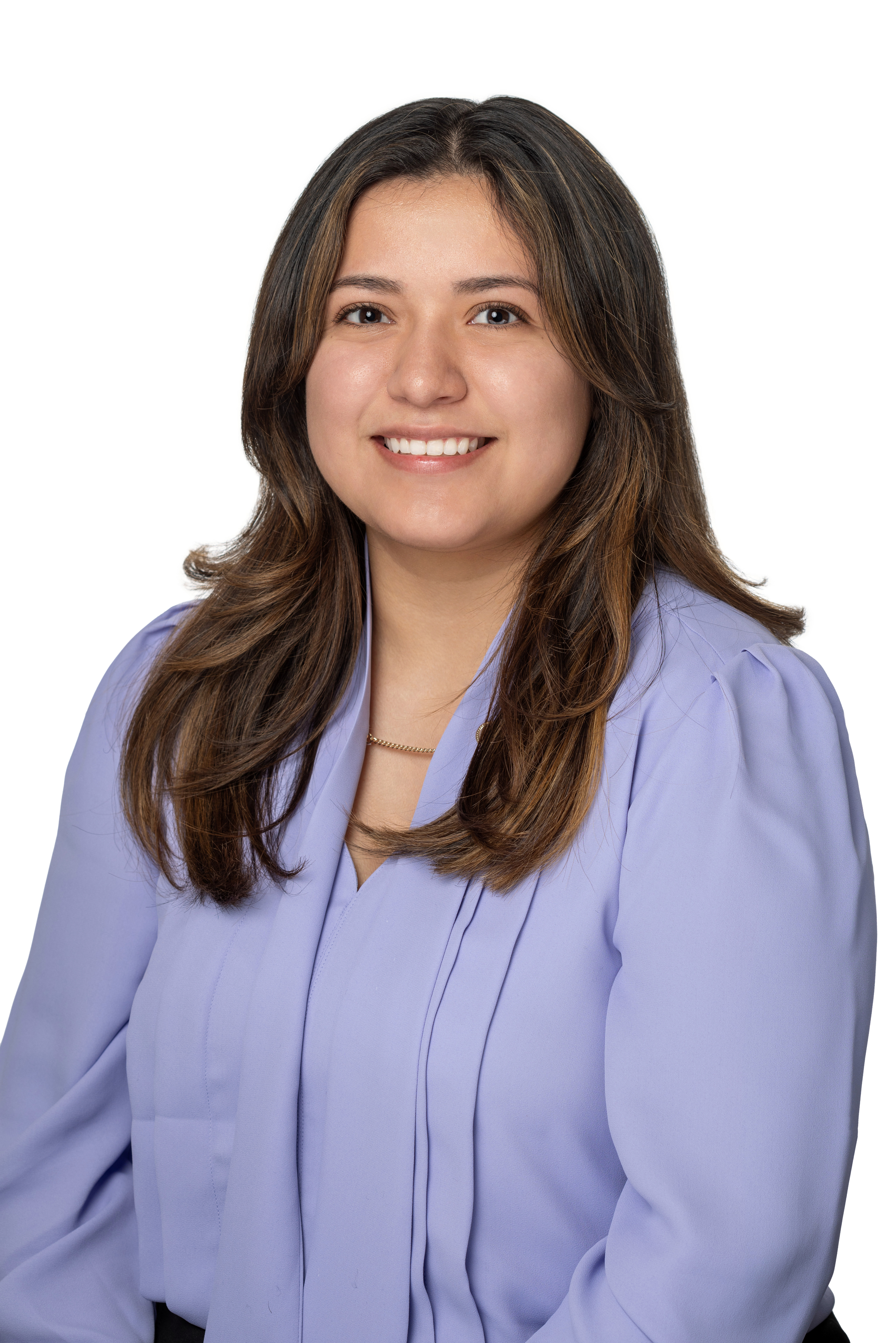 Karla Nazario, Academic Advisor, wearing a light purple blouse and smiling against a light background.