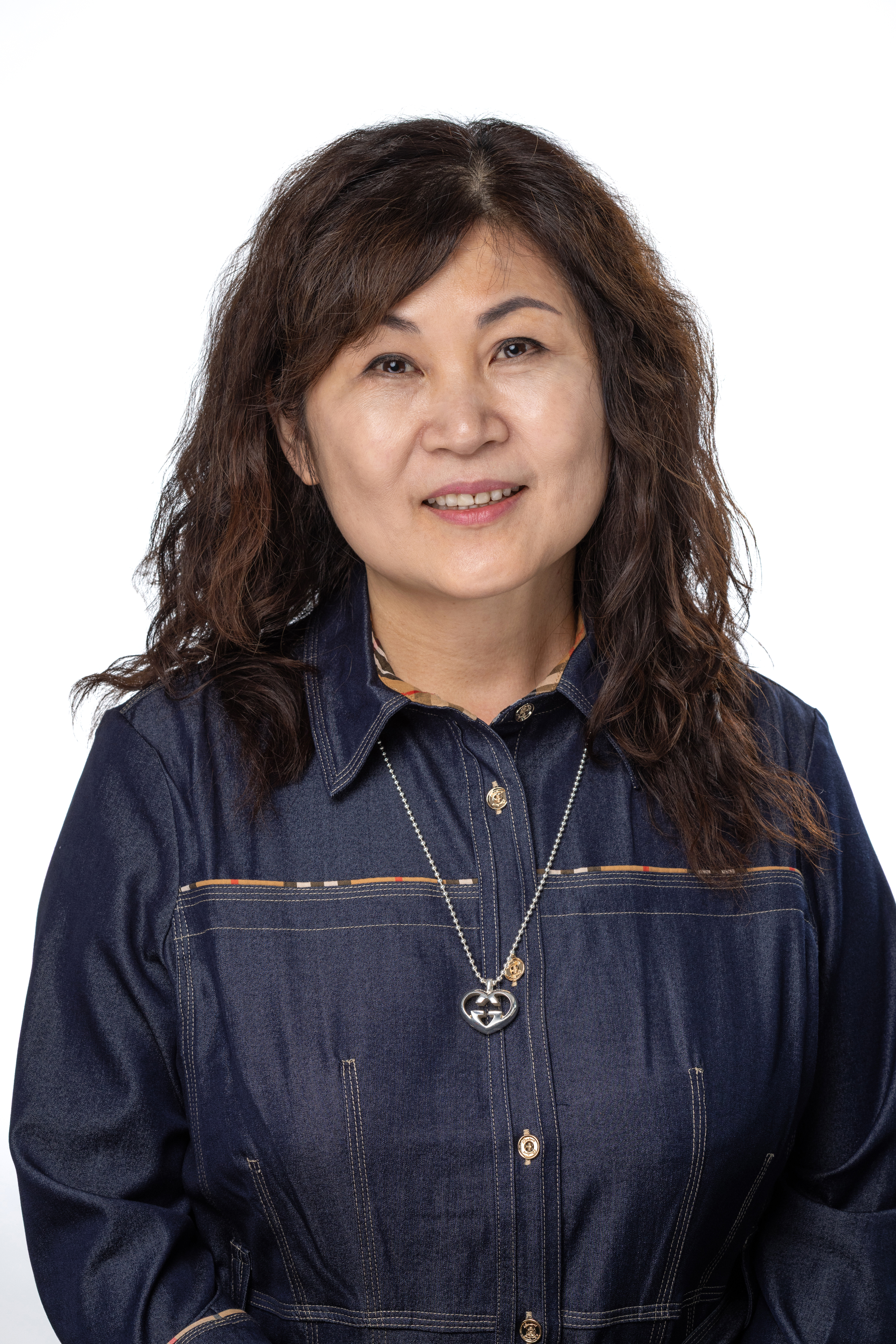 Rana Hong, MSW Program Director and Clinical Assistant Professor, smiling in a studio headshot.