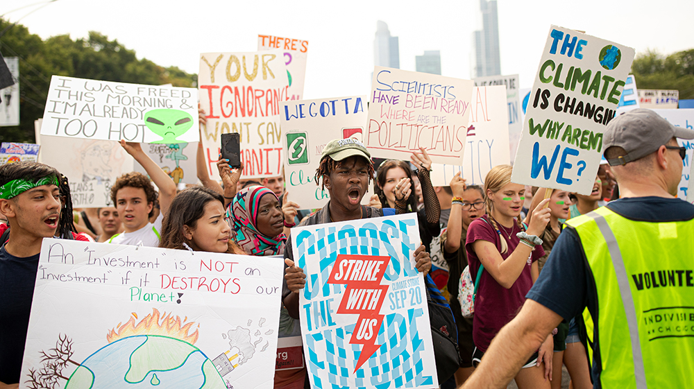 student protesters holding signs