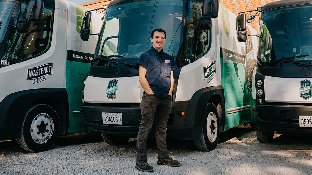 Liam Donnelly in front of a WasteNot van