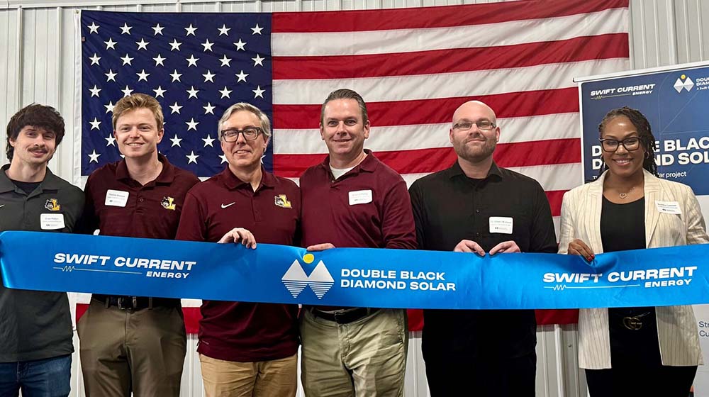 Loyola group at ribbon cutting for Double Black Diamond Solar