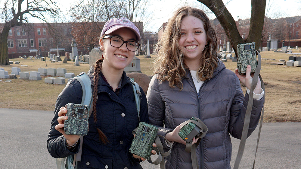 students prepare to install wildlife monitors