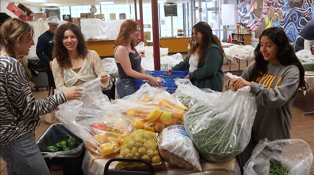 Students gathering donated food