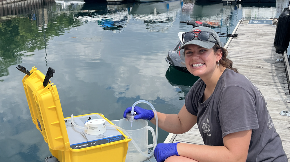 Megan Cunnison in front of a harbor