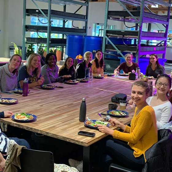 People sitting around a table at a dinner